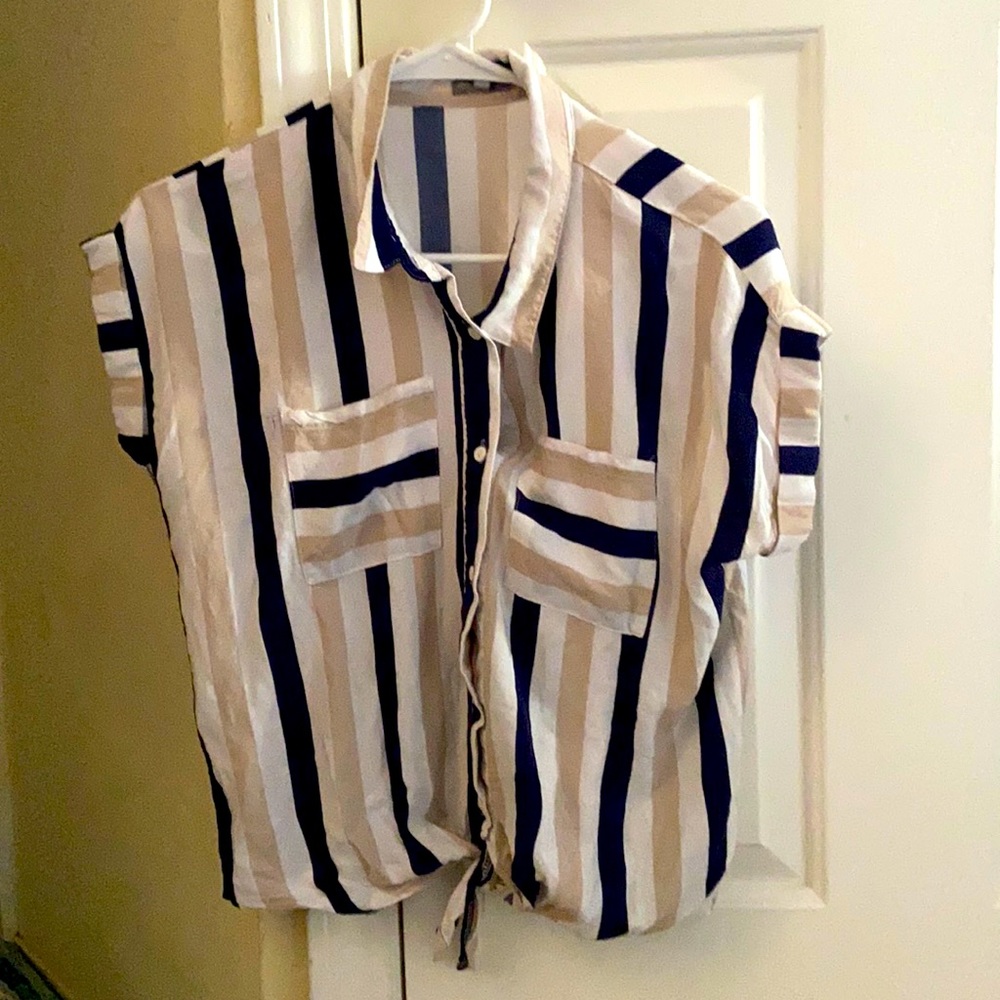 Comfortable yet casual, simple button down top.